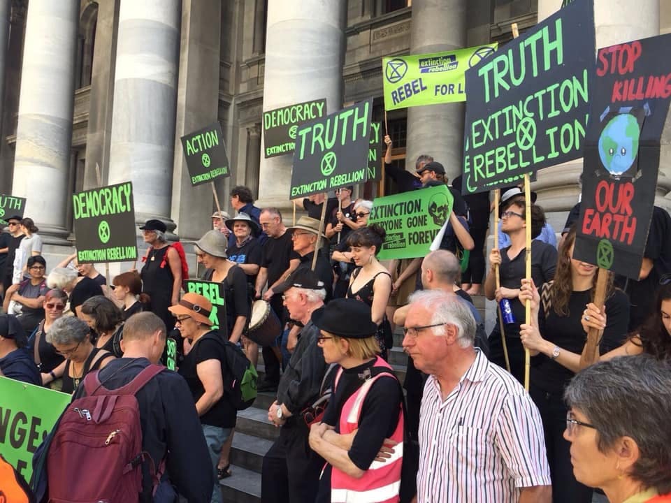 Photograph of XR activists in Adelaide. Many of the placards read “Democracy” and “Truth”