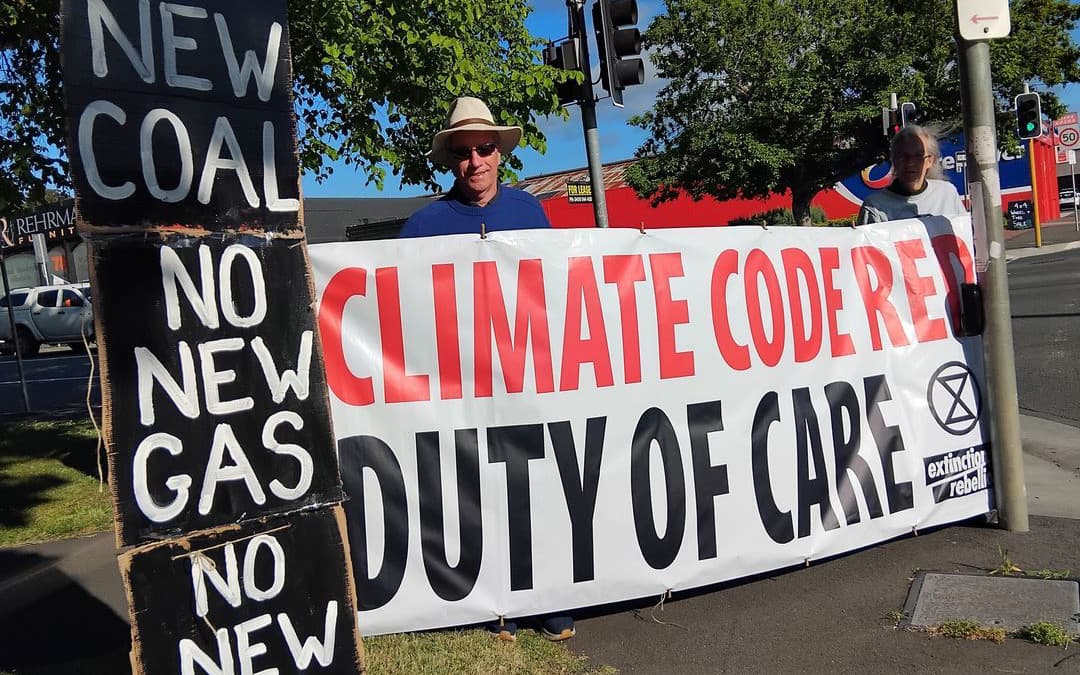 XR Tas rebels with Climate Code Red banner