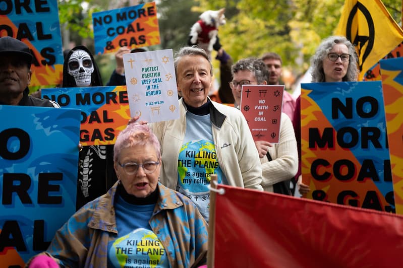 Crowd at a recent climate rally, with placard