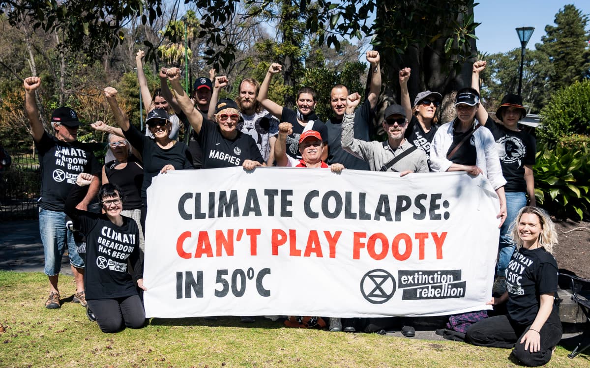 XR Vic activists with banner after the action