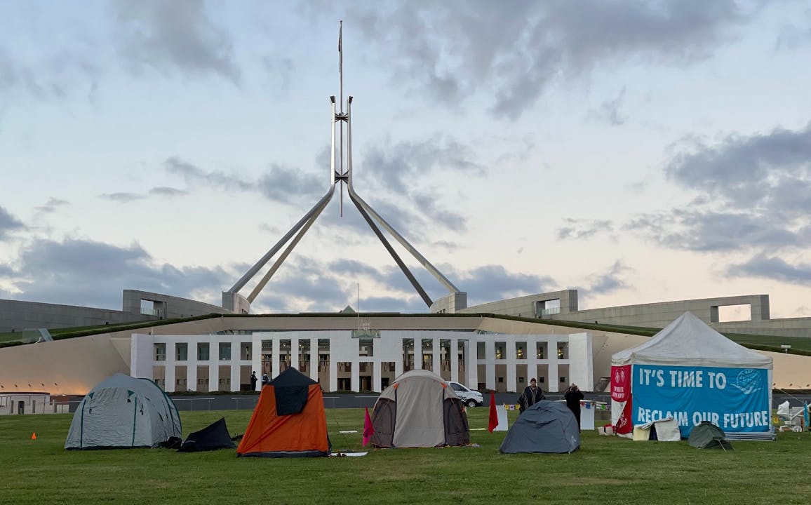 Extinction Rebellion and supporters set up tents on Parliament House lawns