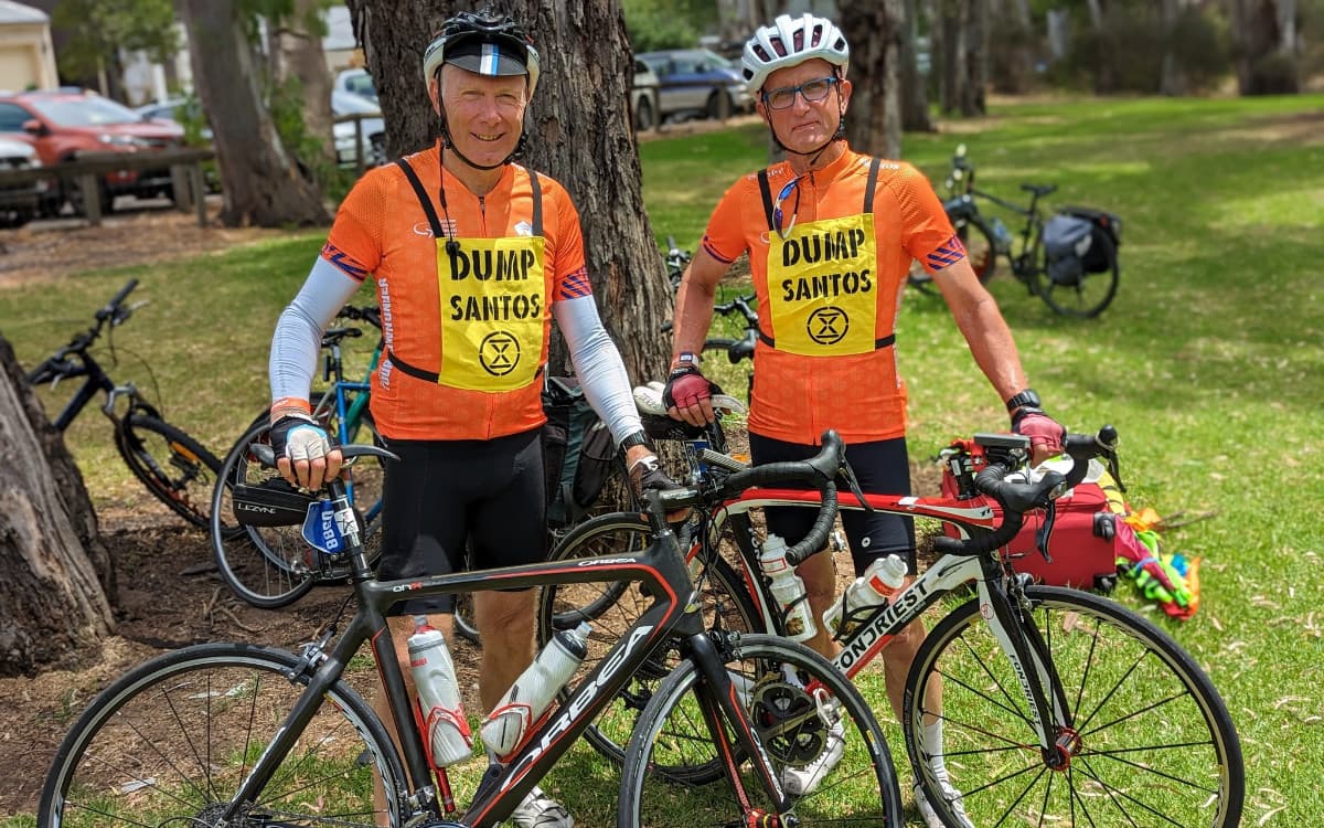 XR SA riders cross TDU race finish line wearing ‘DUMP SANTOS’ message