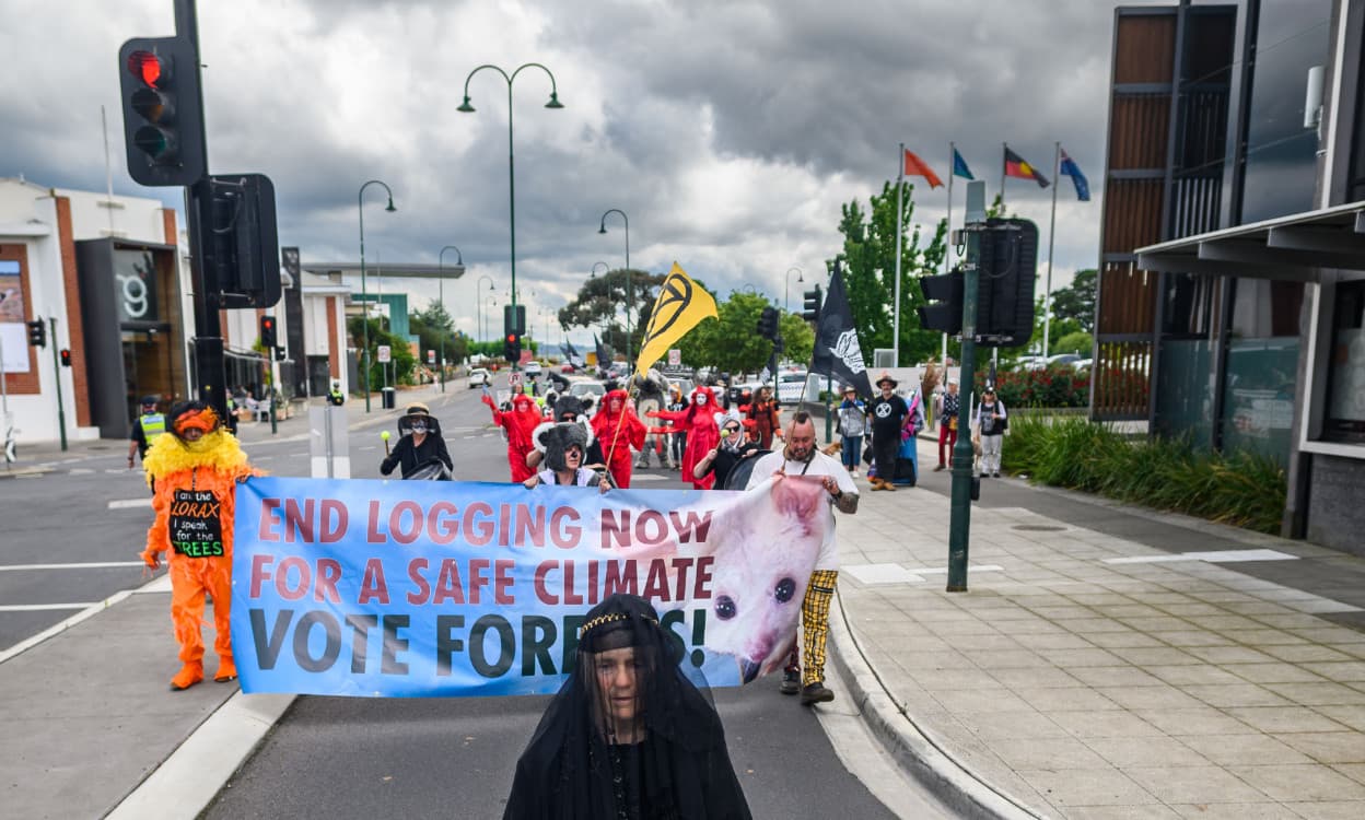 The procession moves past Latrobe City Council offices