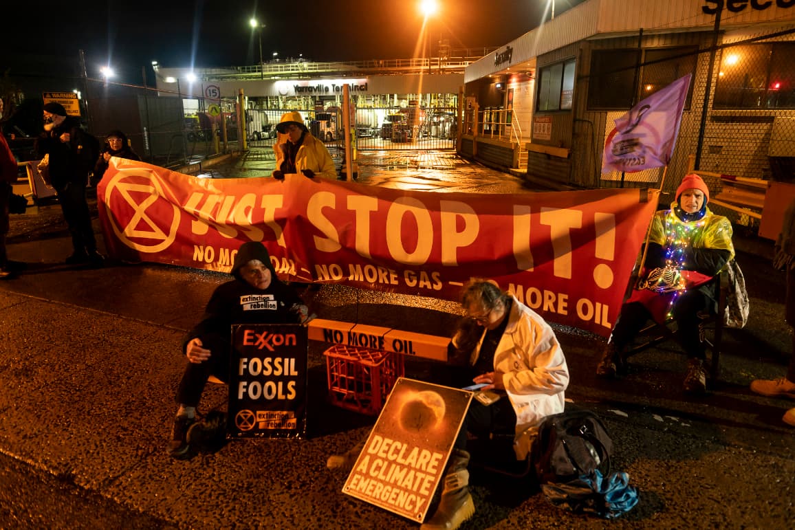 Tony and Karen locked on outside the Exxon Depot