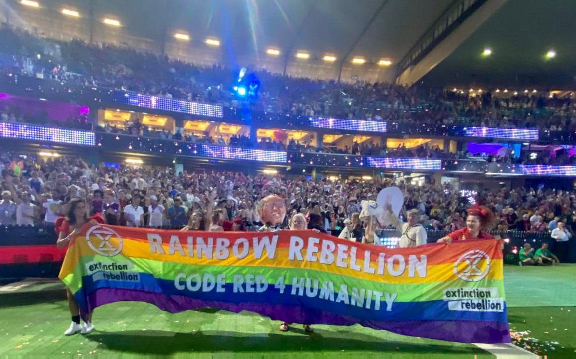 Rainbow Rebellion Sydney rebels holding a banner before the Mardi Gras parade