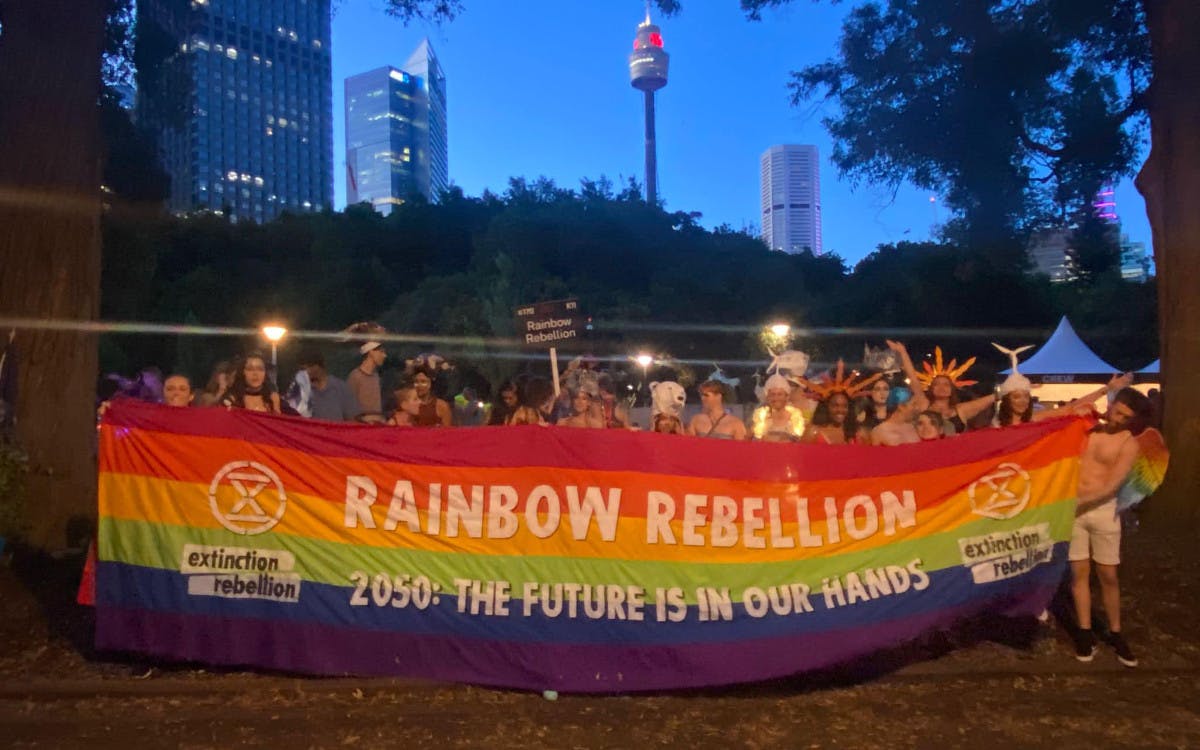 Rainbow Rebellion activists with banner
