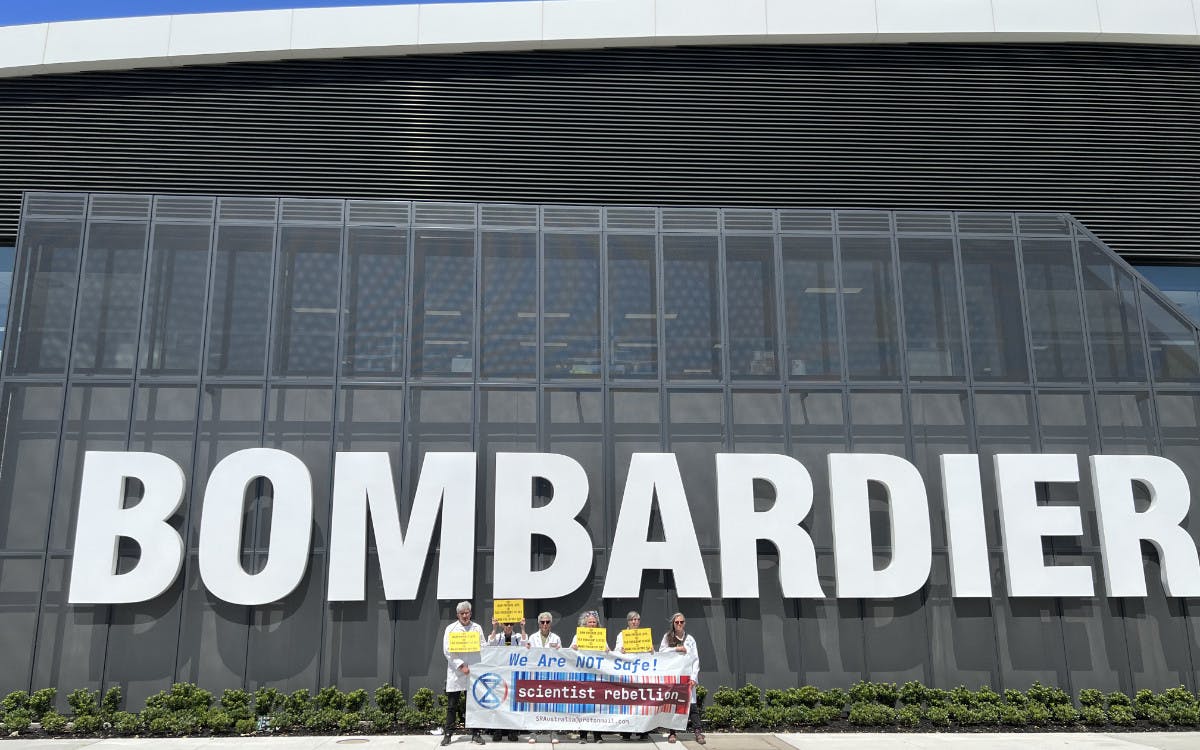 Scientist Rebellion activists outside the Bombardier facility in Essendon, Victoria