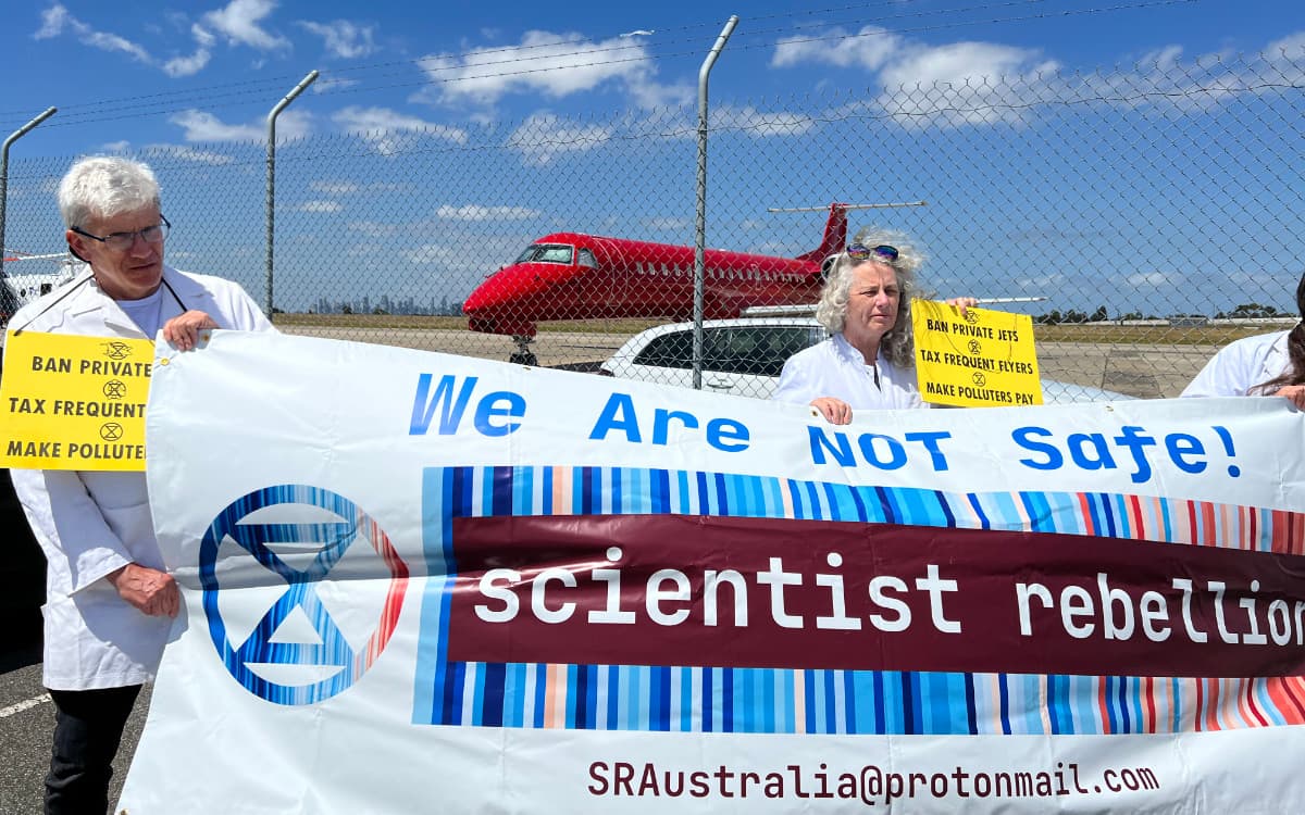 Scientist Rebellion activists at Essendon Airport