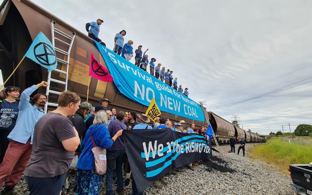 Protest group Rising Tide demand the cancellation of all new coal projects