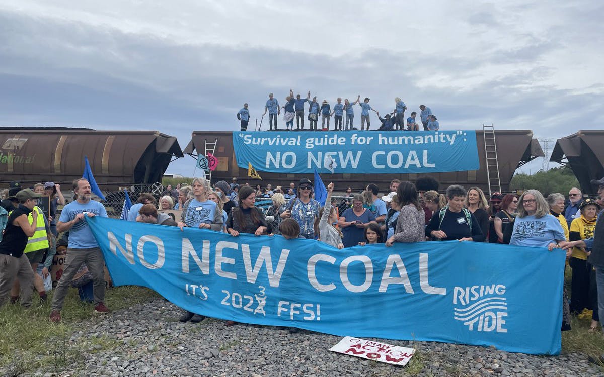 Rising Tide protesters occupy a coal train at Newcastle, NSW