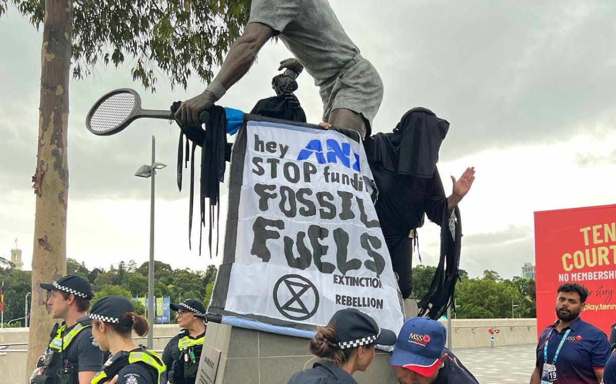 XR Vic protest greenwashing at the Australian Tennis Open Men’s Final
