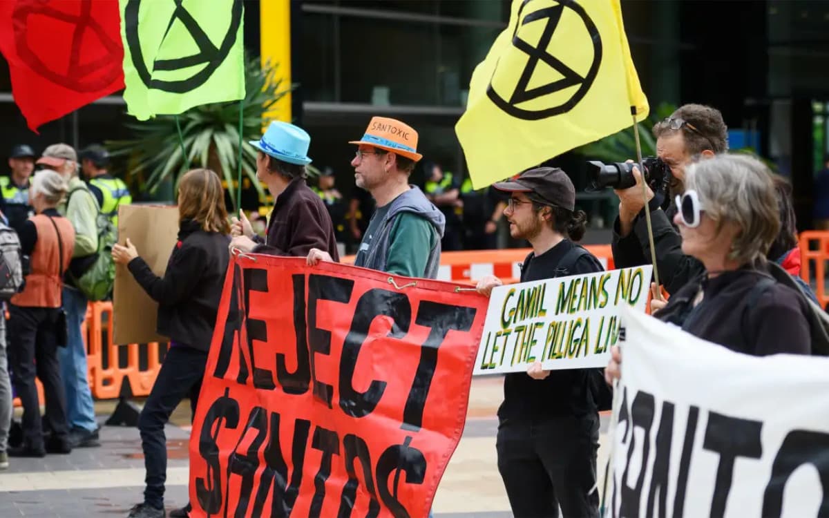 Protesters at the Santos 2023 AGM