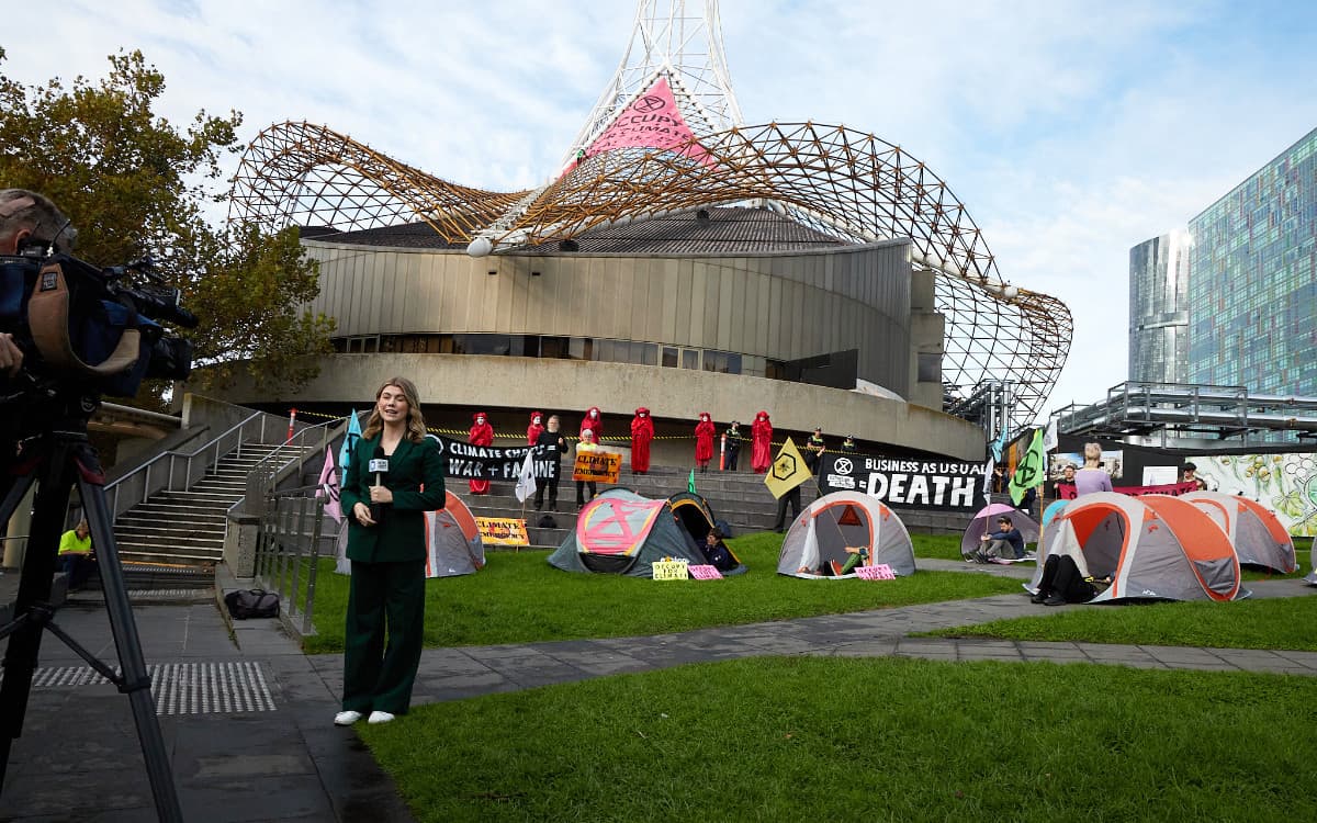 Protesters and tents at the Arts Centre Spire