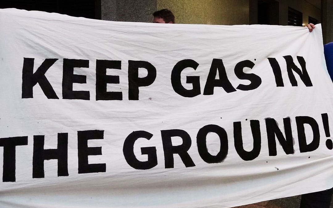 Banner at the International Gas Union protest