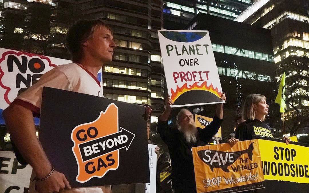 Protesters at the International Gas Union evening party