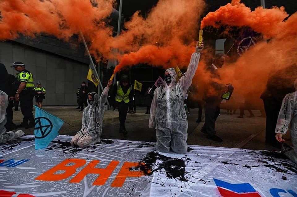 XR activists block entrance to Perth oil and gas conference in spectacular protest action
