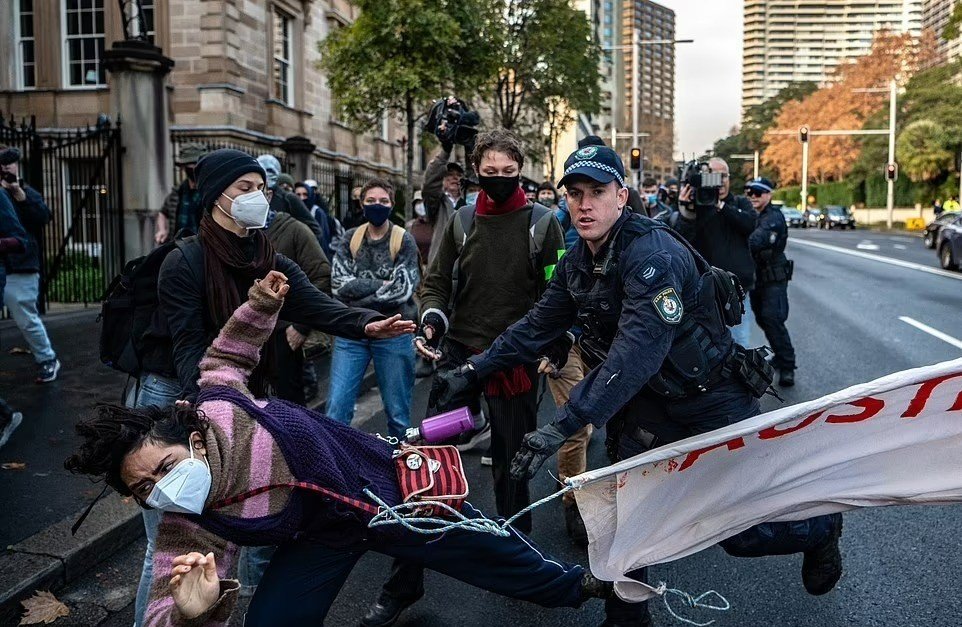 BA activist pushed over by police
