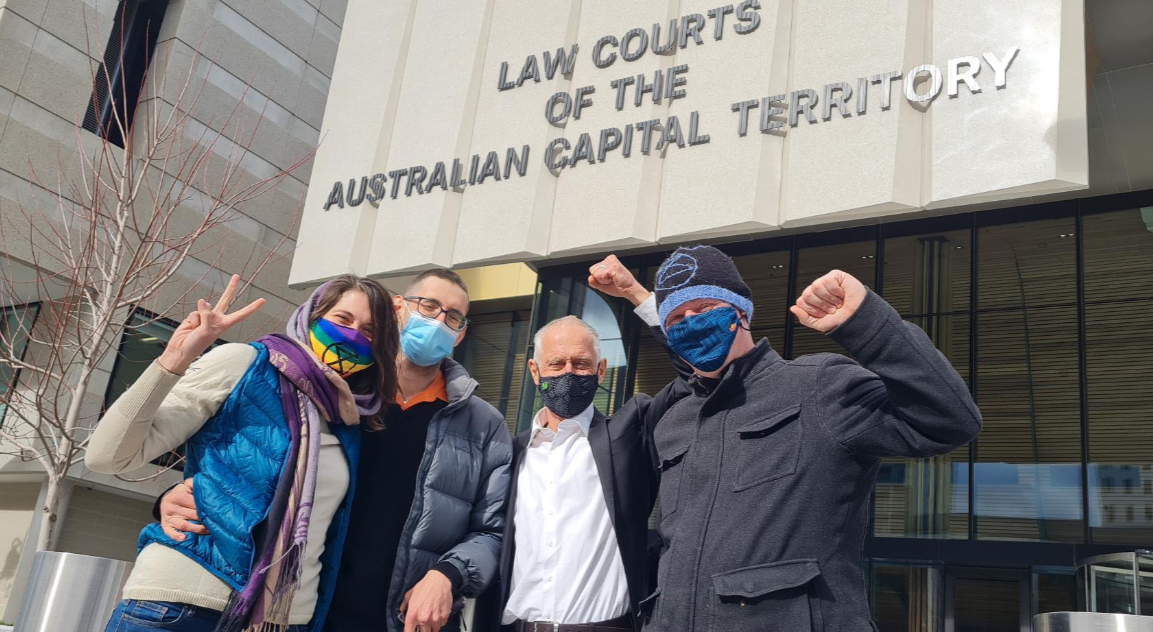 Violet, Andrew, John and Mark outside court
