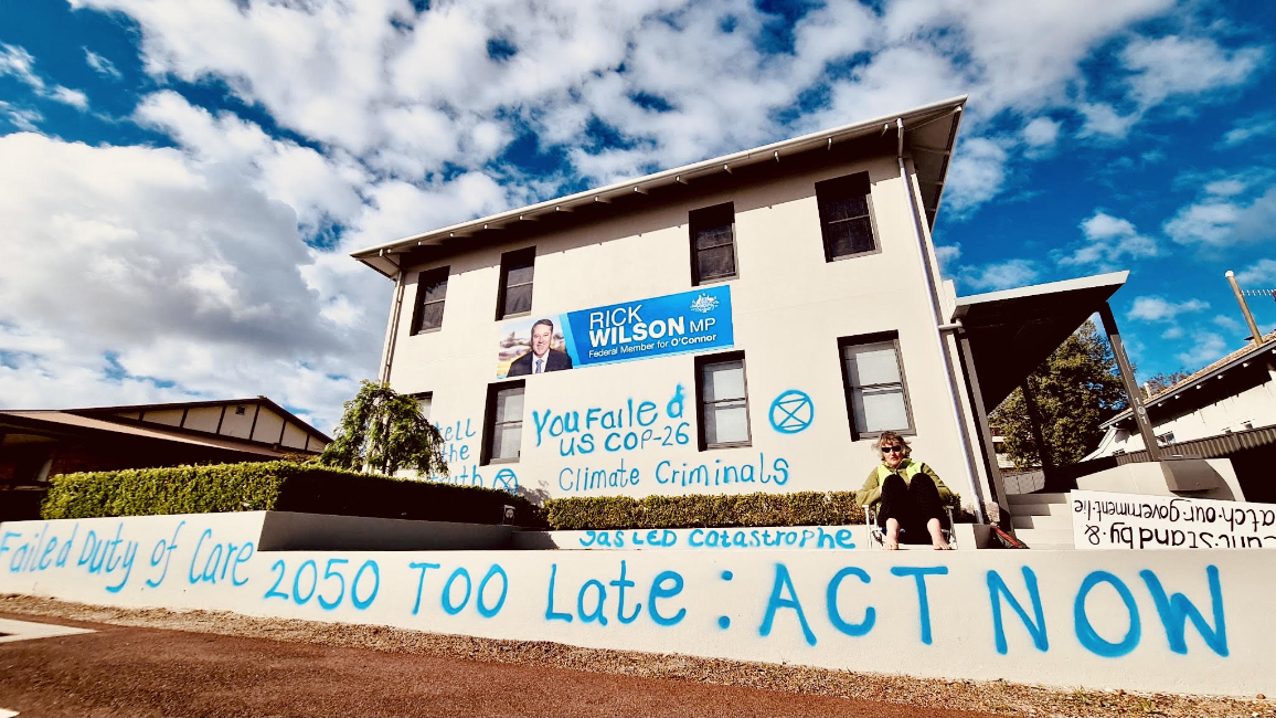 Julie Marsh outside the office of Rick Wilson MP