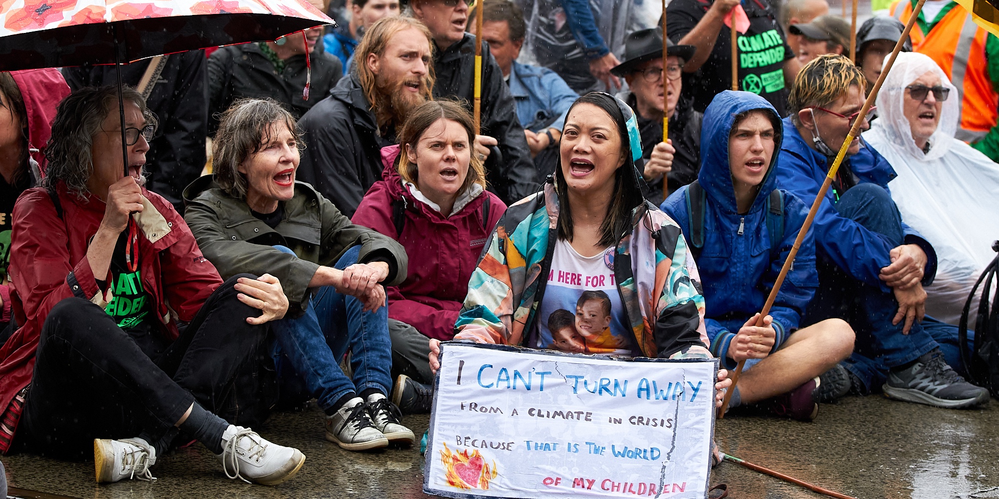 Rebels in the rain at Flinders Street. A display of mass civil disobedience. Credit: Danielle Judd