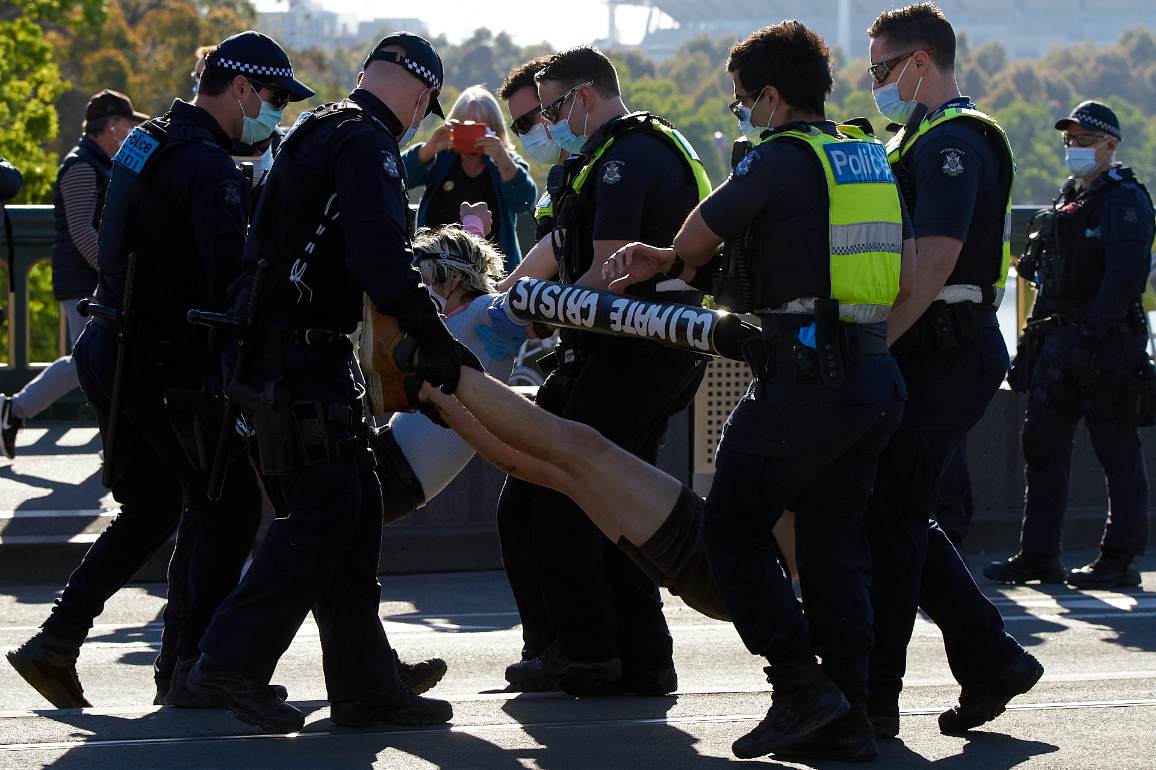 Protesters being removed by police