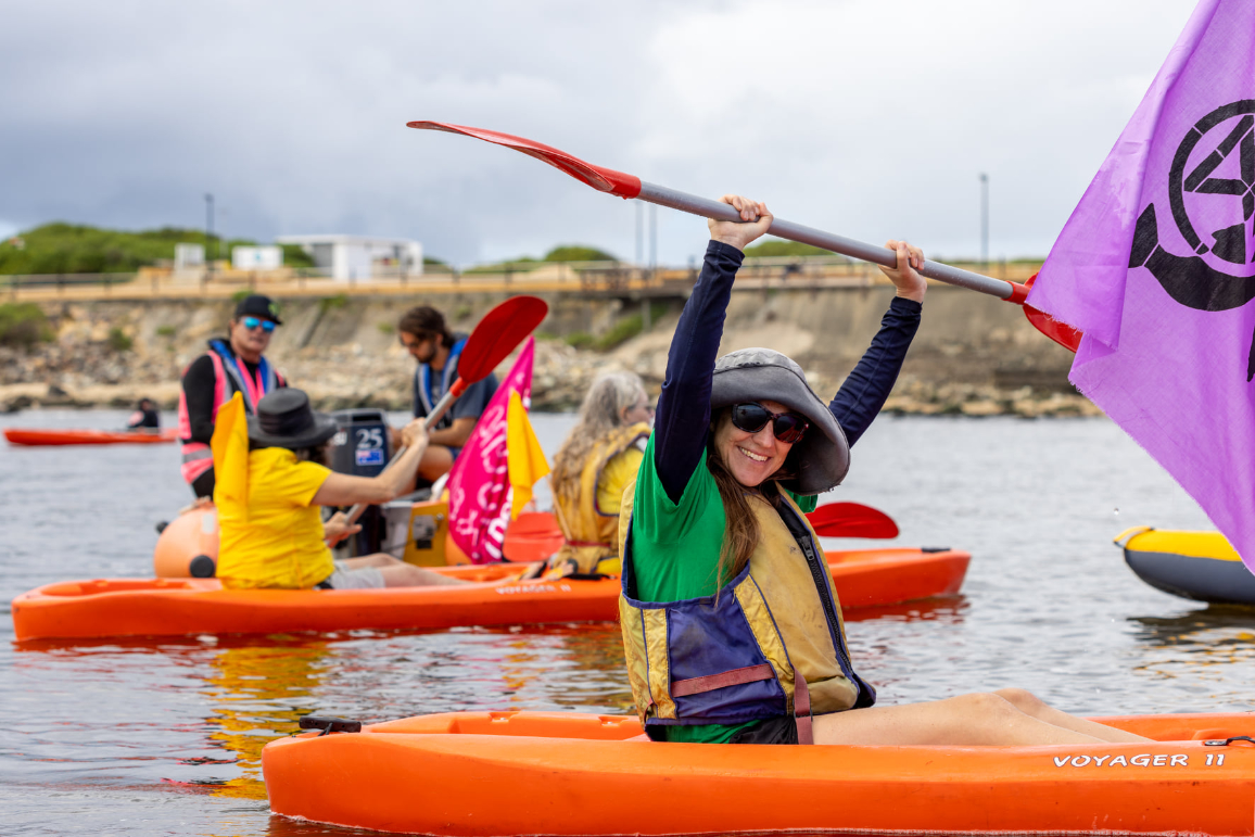 Protester in boat at the Newcastle Port blockade