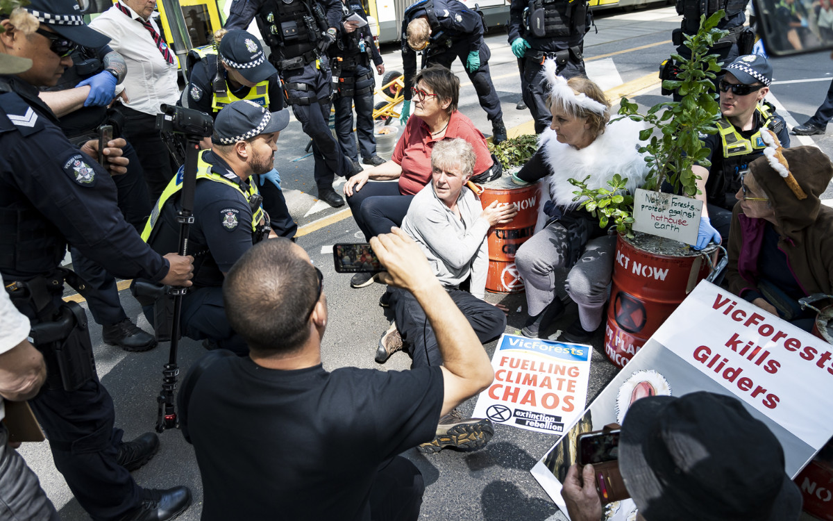 Climate and forest protesters locked on to concrete-filled barrels