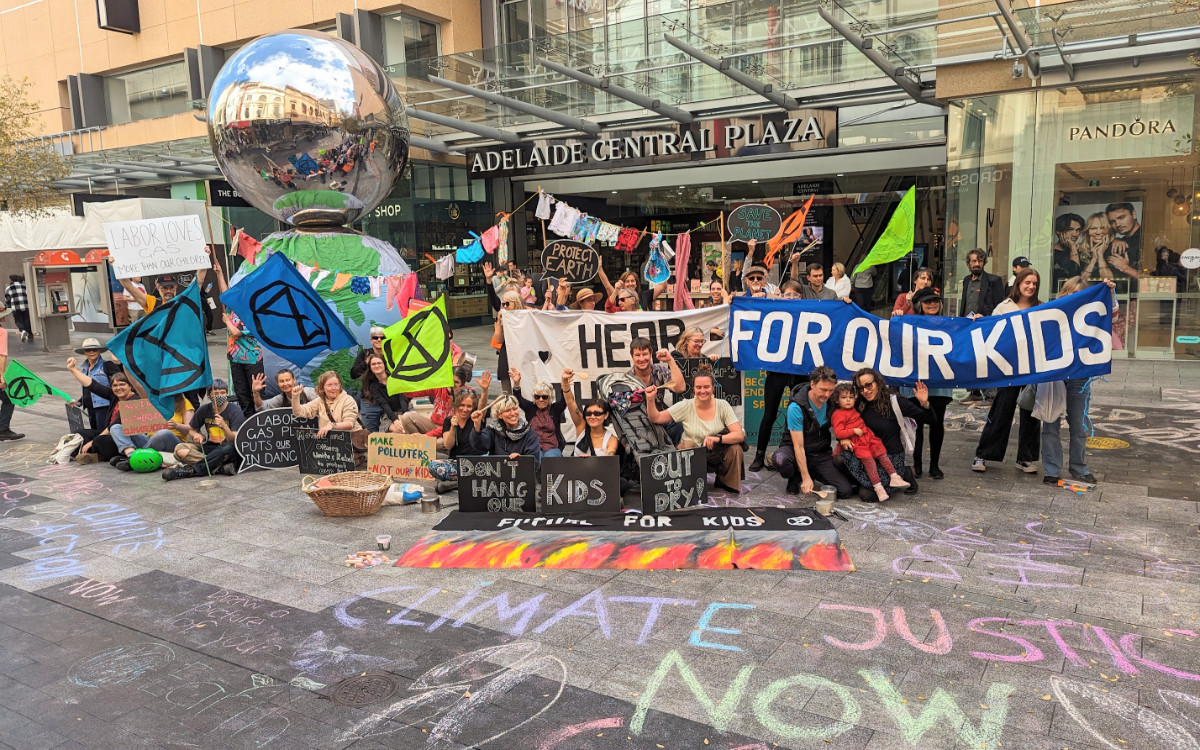 Mothers, caregivers and allies rally in Adelaide's Rundle Mall